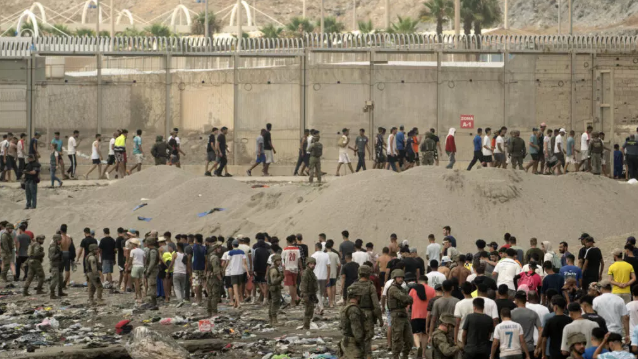Local media report at least 57 migrants died trying to cross into the Spanish territory, where 60,000 entered in one day