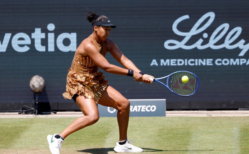 Osaka sinks Wang to reach first grass court final