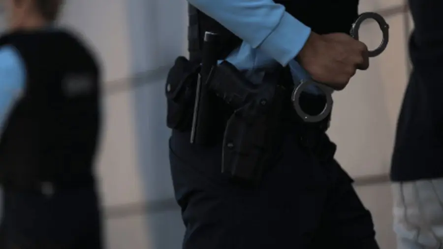 Man arrested for assaulting his partner on children
