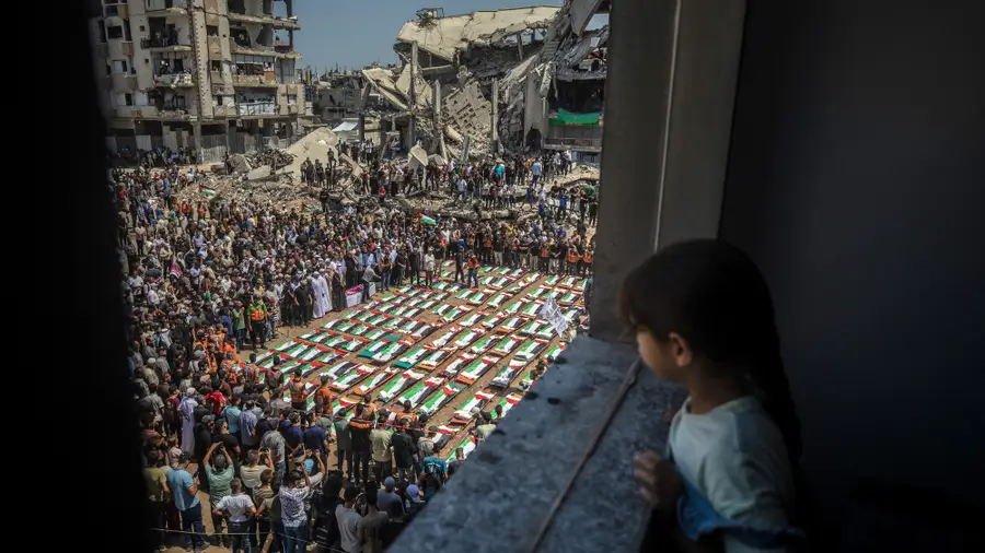 Gaza City holds collective funeral of 112 people