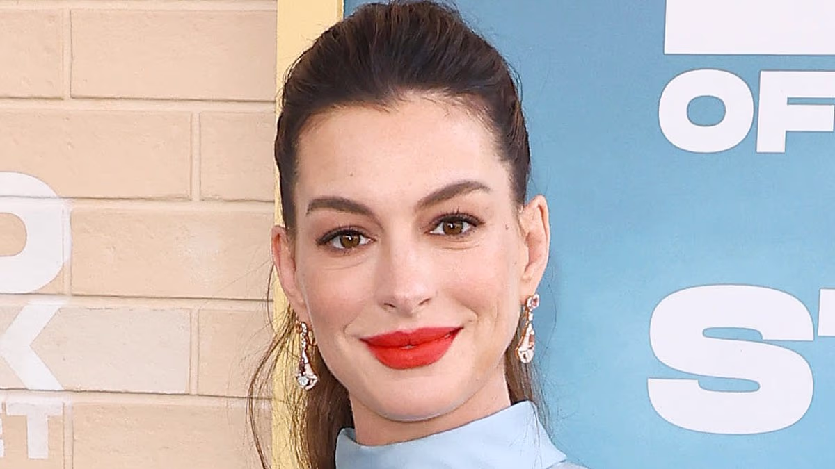 The actress, expecting her third child with husband Adam Shulman, laughs off rumors and shares her joy over the pregnancy