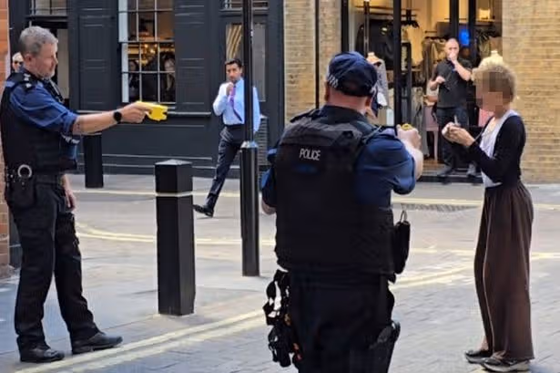 Four 'stabbed with scissors' in Covent Garden as elite cops step in to arrest woman