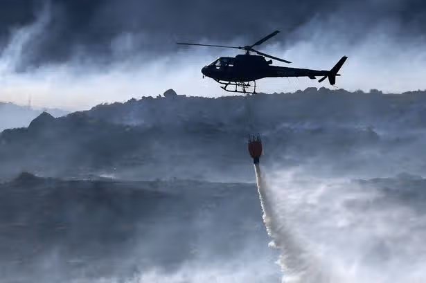Wildfires 'crisis management' plan activated by Welsh Government as helicopter support plea grows