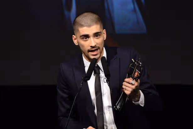 Zayn Malik 'dropped by his manager' after claims he 'punched' Louis Tomlinson