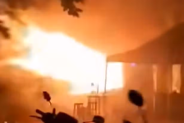 Video shows people flee as flames rip through Bangkok pub