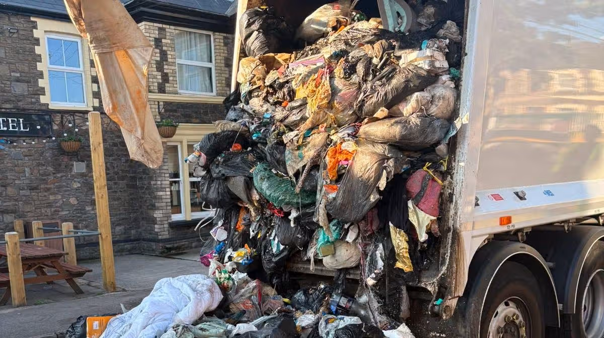 Bin lorry bursts into flames opposite Cardiff pub