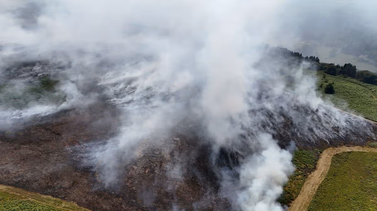 Helicopter finally deployed to fight Welsh wildfires day before rain is set to hit
