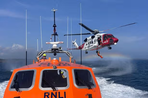 Coastguards in Wales could be forced to stop lifesaving work if pay cuts go ahead