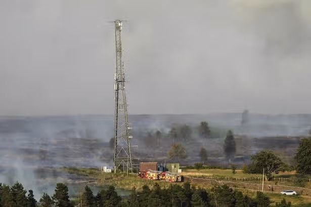 Public warned as huge fire causing stink that people can smell 30 miles away