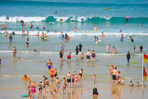 Two people die after being pulled from sea at famous beach