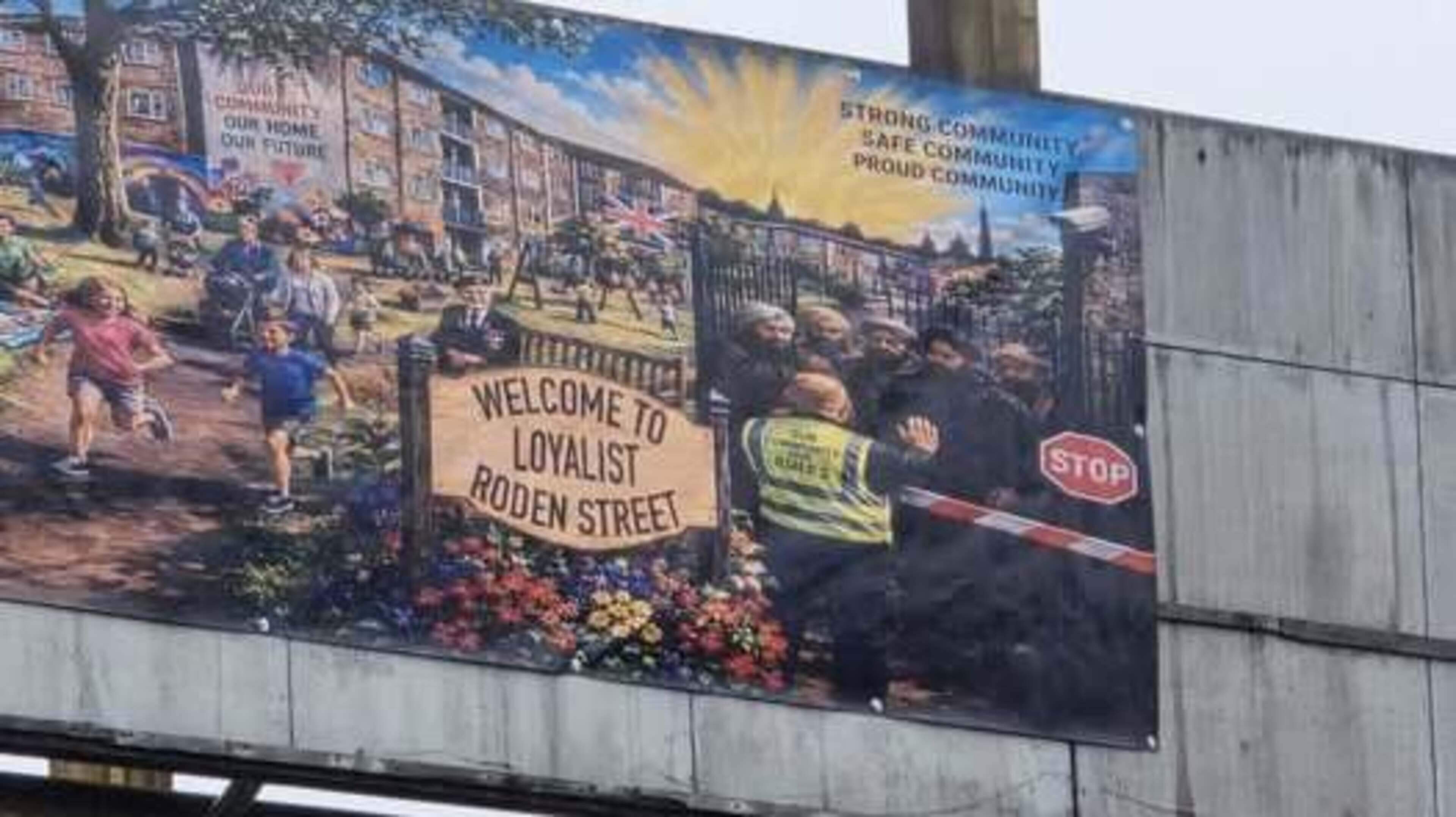 Loyalist west Belfast group threaten against removal of ‘racist’ AI banner