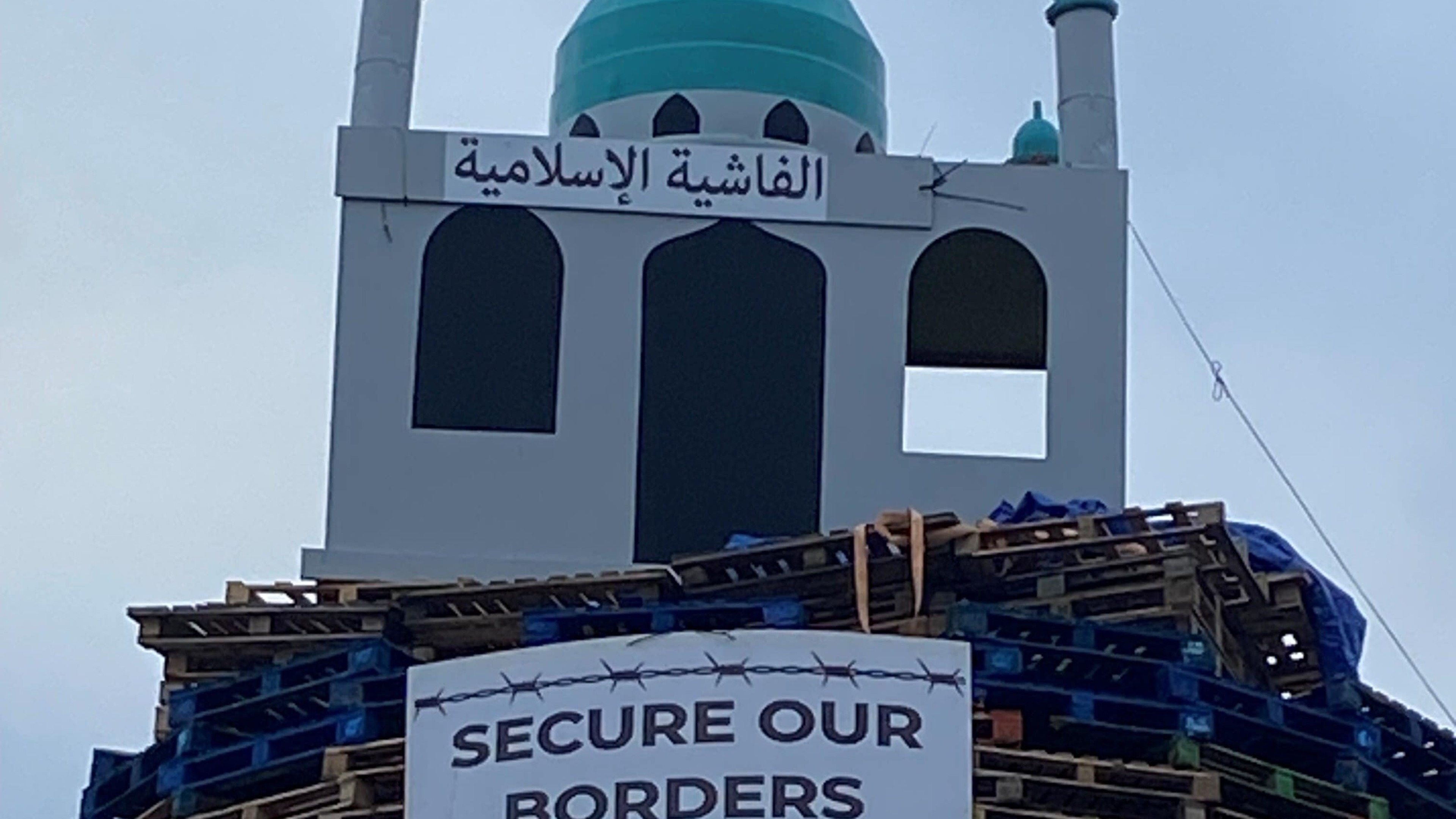 Three men arrested as part of probe into model of mosque on bonfire