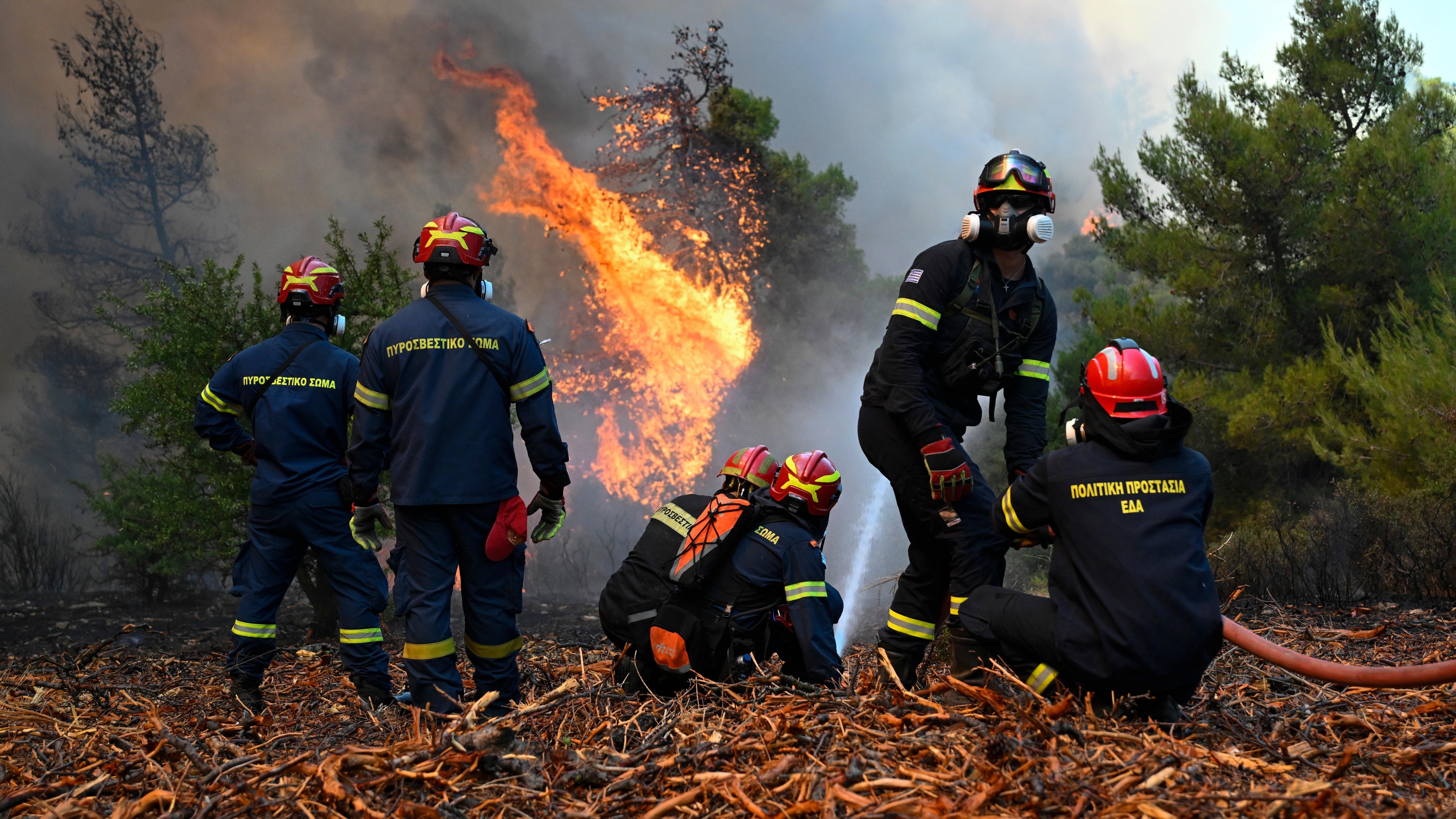 Greek wildfires halted after fatal helicopter crash