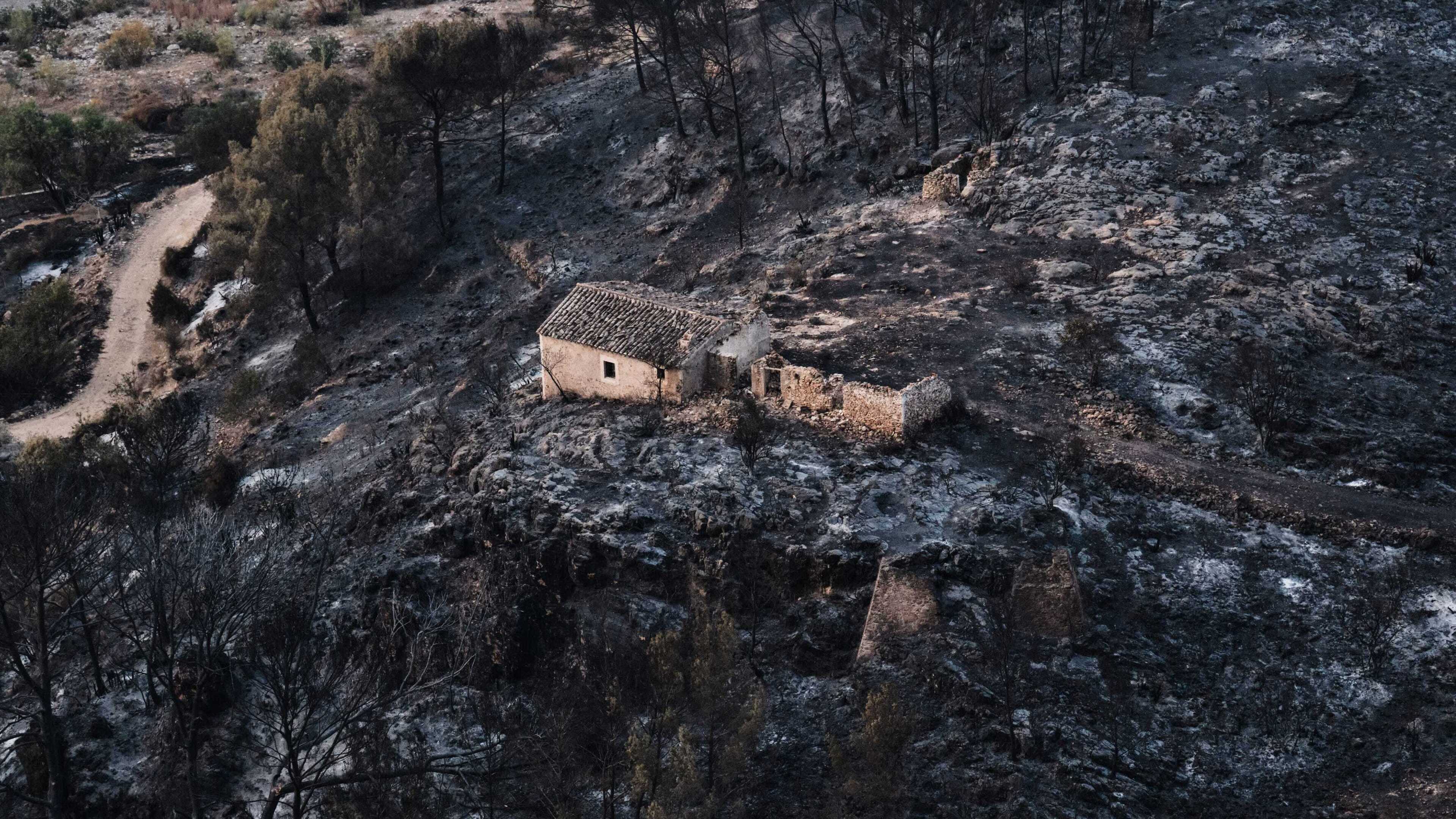Hundreds of firefighters battle wildfire in Spain which killed at least 12