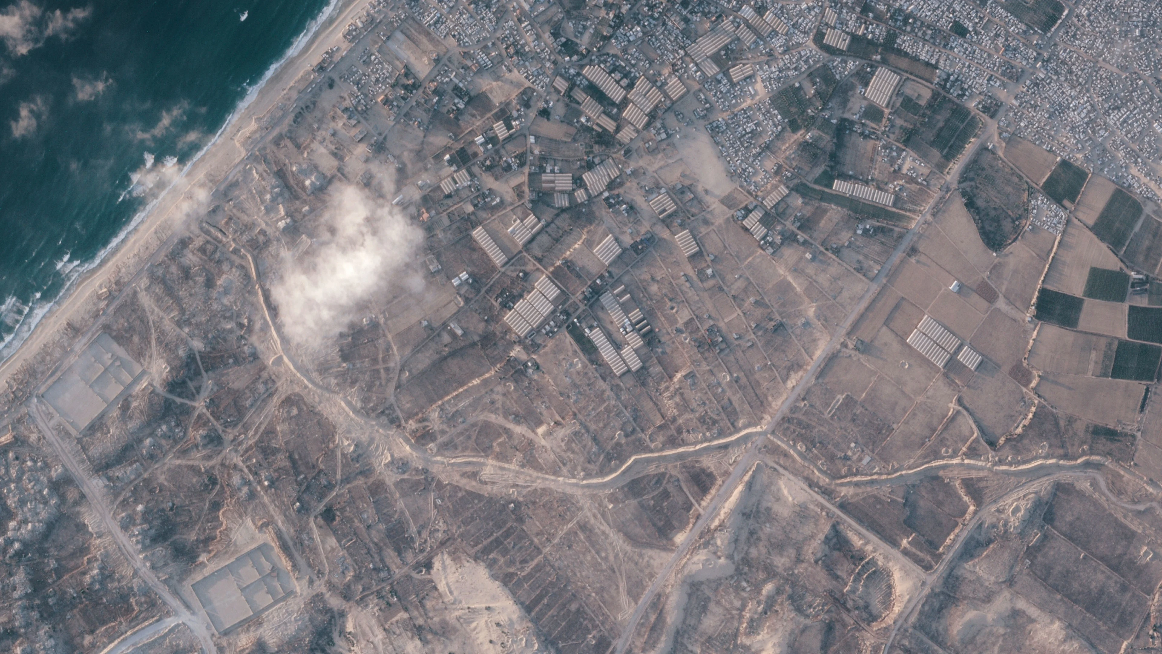 Israel builds miles-long earth barrier inside Gaza