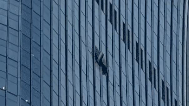 The CITIC Tower, also known as China Zun, sustained a gaping hole as rescue operations began amid an information blackout