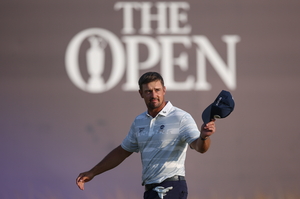 The American golfer drew laughter by flicking a pine cone and calling it a 'loose impediment' at the British Open