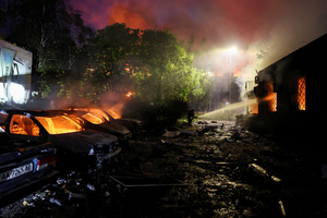 Explosions rocked the capital early Sunday, with fires breaking out and air raid alerts across central and eastern Ukraine