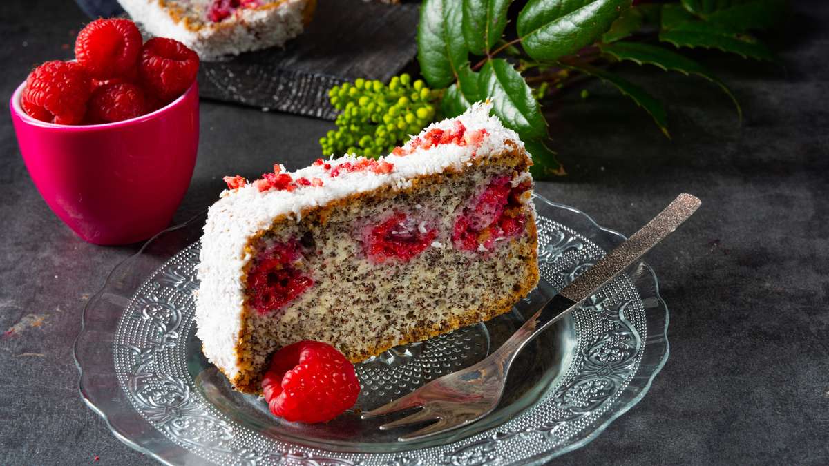 A piece of summer: cake with fresh blueberries, raspberries and currants