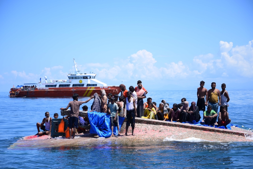 Rohingya refugees among over 500 feared dead after Myanmar boats capsize