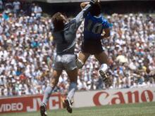 Kissed by Maradona’s foot and stroked by God’s hand – Ball brings millions in proceeds
